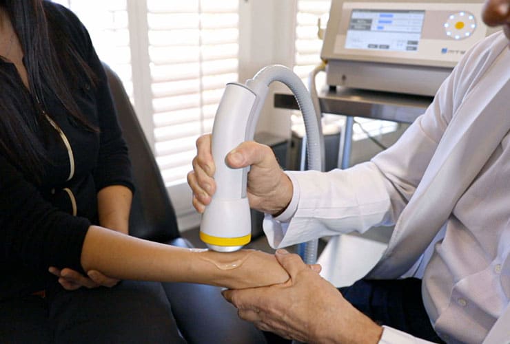 SoftWave Therapy session.